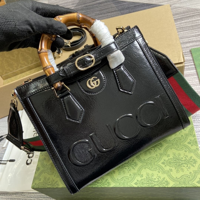 G*u*i top handle bags